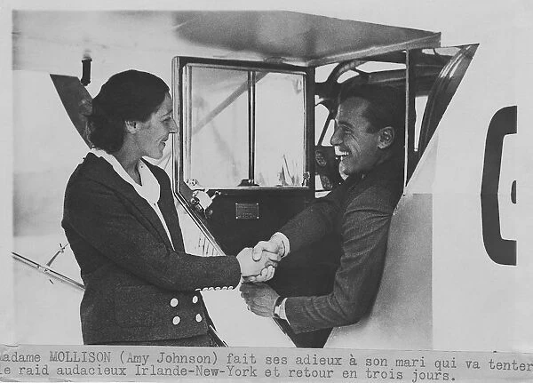 Amy Johnson Shaking Hands with her Husband Jim Mollison ?