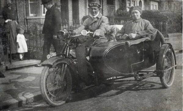 Gentlemen on a 1922 Royal Enfield motorcycle & sidecar