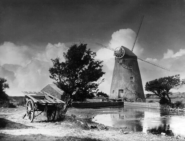 The lovely old windmill at Rhosneigr, Isle of Anglesey, Wales. Date: 1939
