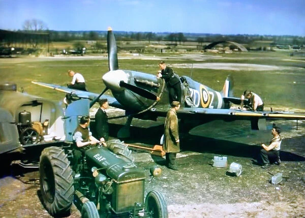 Supermarine Spitfire IX-being armed and pre flighted of