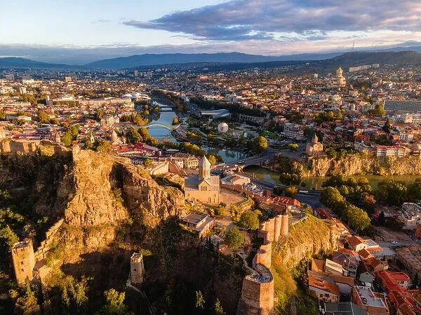 Aerial cityscape view of Tbilisis old town at sunrise, Tbilisi, Georgia (Sakartvelo)