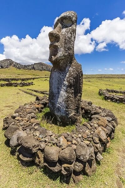 Single moai statue guards the entrance at the 15 moai restored ceremonial site of Ahu Tongariki on Easter Island (Isla de Pascua) (Rapa Nui), UNESCO World Heritage Site, Chile, South America