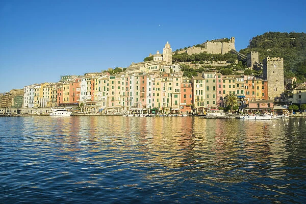 The blue sea frames the typical colored houses of Portovenere La Spezia province Liguria