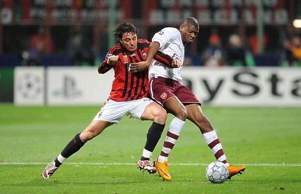 Abu Diaby (Arsenal) Massimo Oddo (AC Milan)
