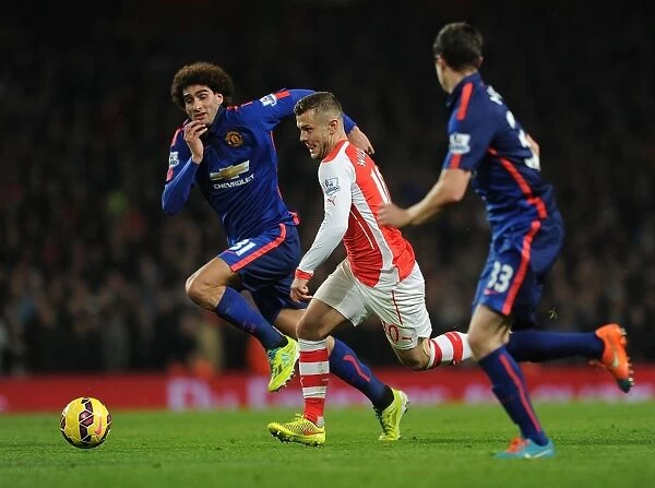 Jack Wilshere Battles Past Fellaini and McNair in Arsenal vs Manchester United Clash (2014-15)