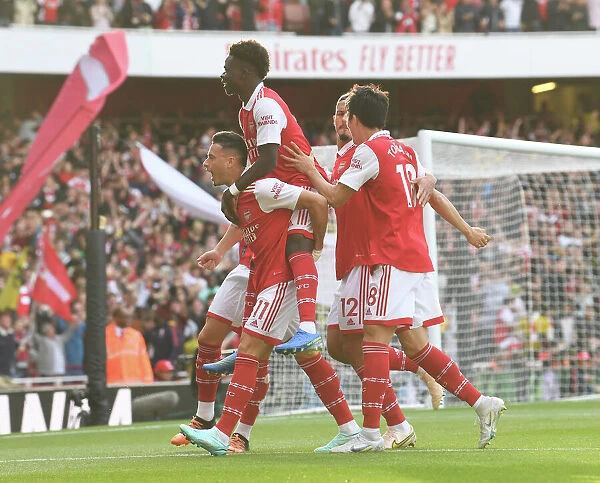 Martinelli and Saka Celebrate Arsenal's First Goal Against Liverpool (2022-23)