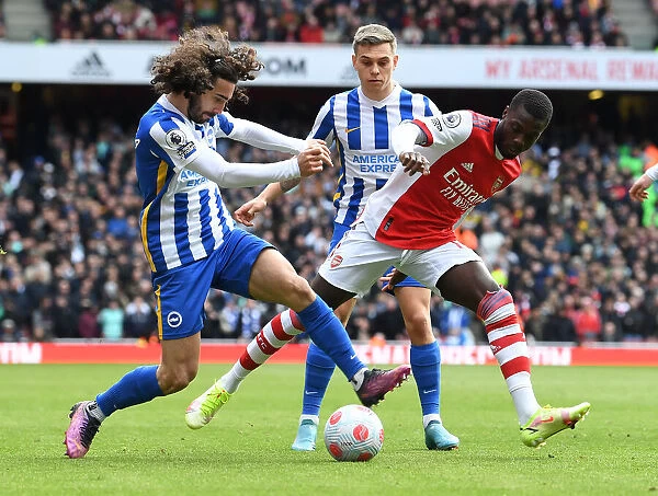 Pepe's Battle: Arsenal Star Goes Head-to-Head with Cucurella and Trossard in Intense Arsenal vs Brighton Clash (2021-22)