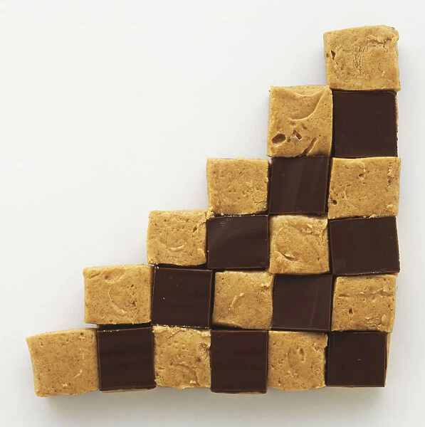 Square blocks of peanut butter sweets arranged in chessboard pattern