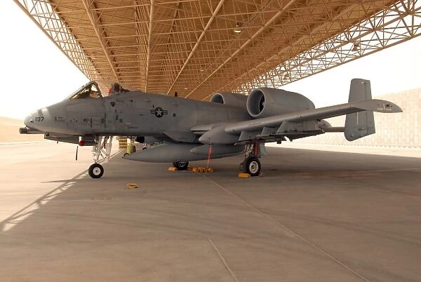 An A-10 Thunderbolt II awaits a mission at an airbase