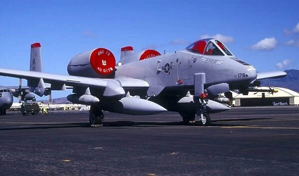 An A-10 Thunderbolt II parked on the flightline at Hickham Air Force Base