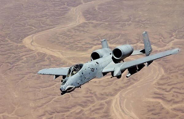 An A-10 Thunderbolt soars above the skies of Iraq