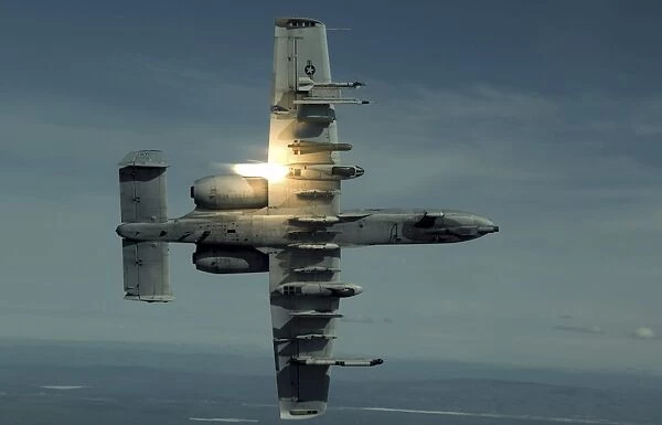 An A-10 Warthog breaks over the Pacific Alaska Range Complex during live fire training