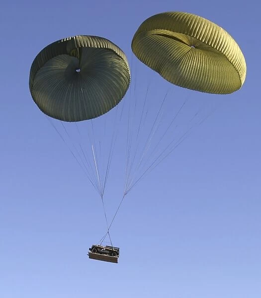Air Delivery Platoon drops heavy equipment from a C-17