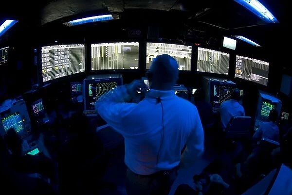Air Traffic Controller watches as a flight cycle begins