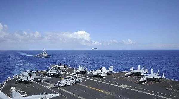Aircraft arranged on the flight deck of aircraft carrier USS Nimitz