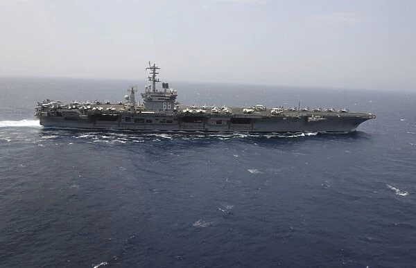 The aircraft carrier USS Nimitz transits the Red Sea