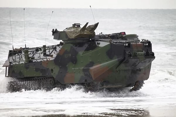 An amphibious assault vehicle drives toward Onslow Beach