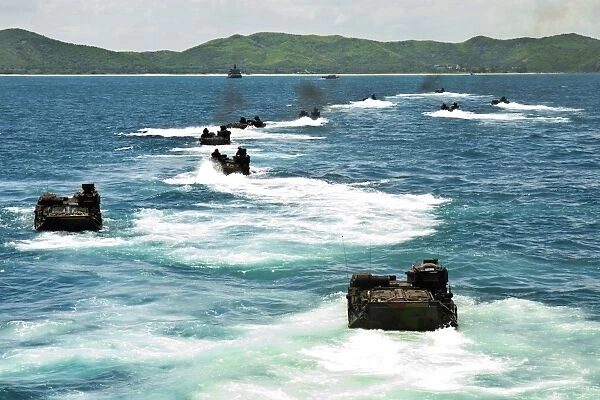 Amphibious assault vehicles approach Hat Yao beach, Thailand