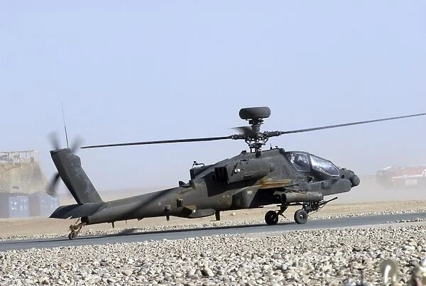An Apache helicopter prepares for takeoff at Camp Bastion, Afghanistan