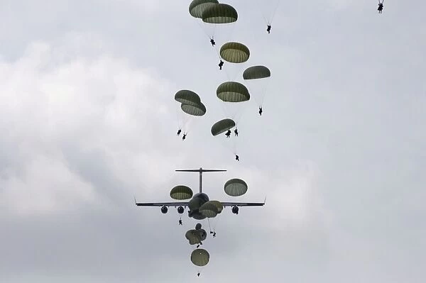 Army Soldiers jump out of a C-17 Globemaster III