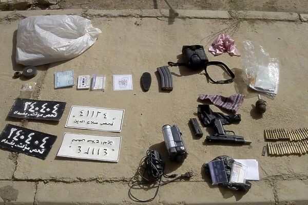 An assortment of improvised explosive device materials and munitions