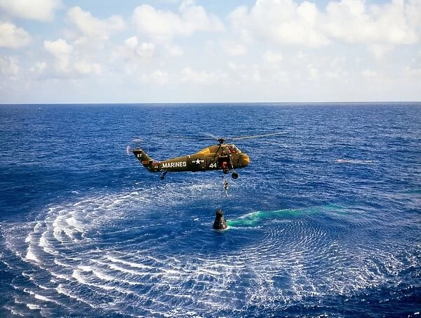 An astronaut is rescued by a U. S. Marine helicopter
