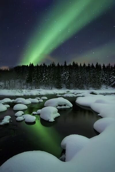 Aurora Borealis over Tennevik River in Troms County, Norway