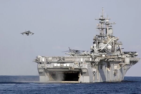 An AV-8B Harrier prepares to land on board amphibious assault ship USS Essex