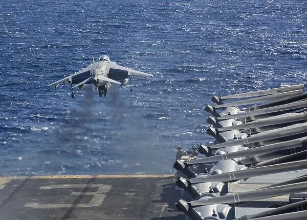 An AV-8B Harrier takes off from the flight deck of the USS Kearsarge