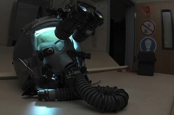 AN  /  AVS-9 Night Vision Goggles sit atop a fighter pilots helmet
