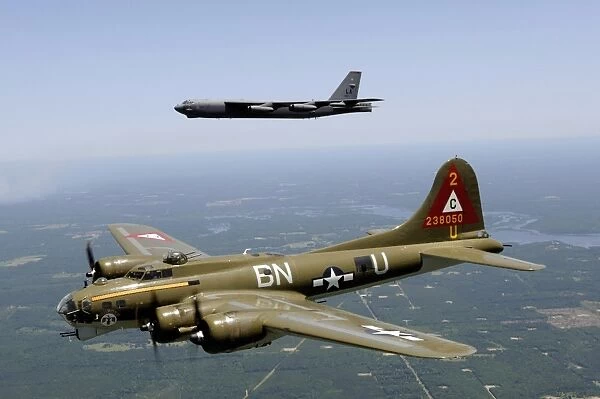 A B-17G Flying Fortress participates in a heritage flight with a B-52H Stratofortress