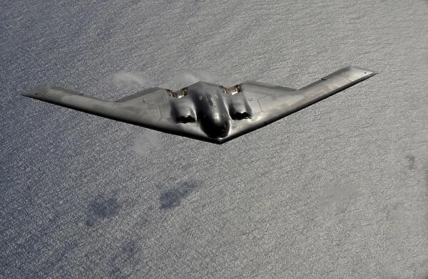 A B-2 Spirit flies over the Pacific Ocean