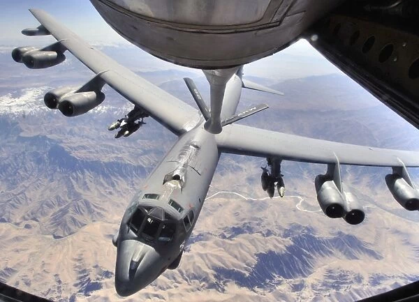 A B-52 Stratofortress receives fuel from a KC-135 Stratotanker over Afghanistan