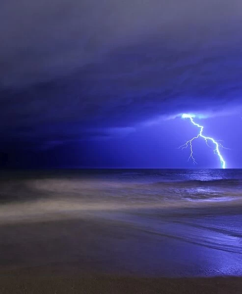 A bolt of lightning from an approaching storm in Miramar, Argentina