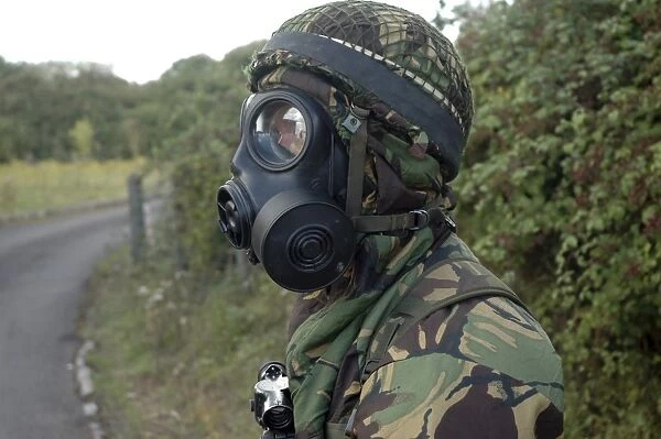 British soldier in full NBC protection gear and a S6 respirator