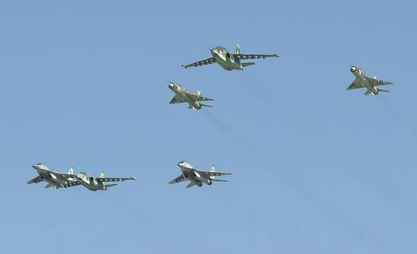 Bulgarian Air Force MiG-21, MiG-29 and Su-25 aircraft flying on a clear day