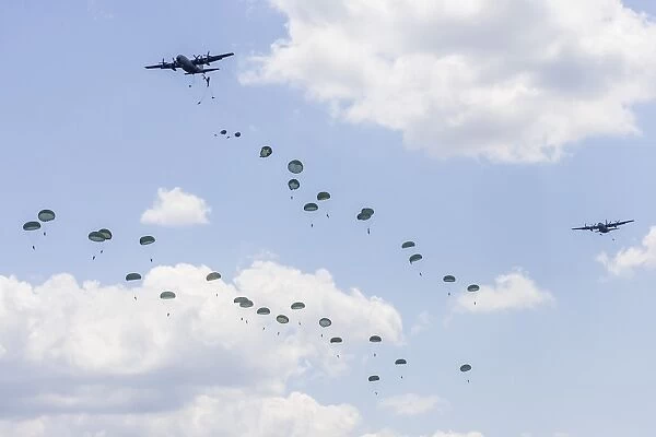 A C-130 Hercules drop U. S. Army airborne troops over Maryland