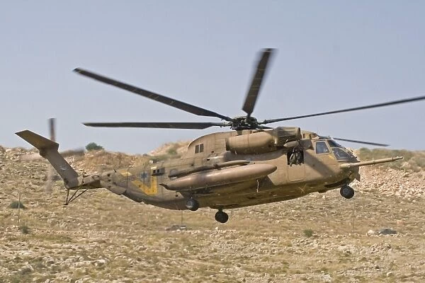 A CH-53 Yasur 2000 of the Israeli Air Force landing in the field