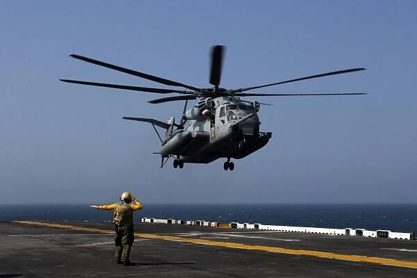 A CH-53E Super Stallion helicopter aboard the amphibious assault ship USS Bataan