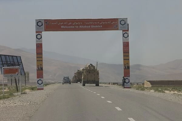 A convoy of Cougar MRAPs driving towards Aliabad, Afghanistan