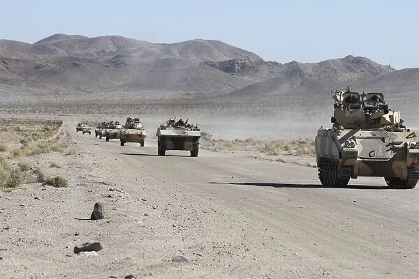 Convoy of military vehicles traveling in Fort Irwin, California