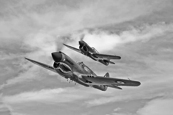 Two Curtiss P-40 Warhawks in flight near Nampa, Idaho