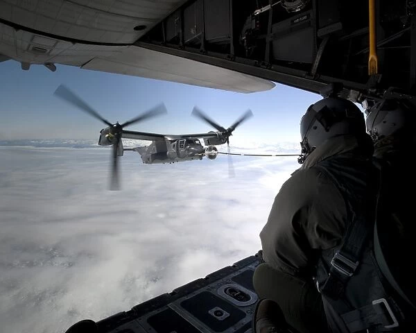 A CV-22B Osprey receives fuel off the coast of Greenland