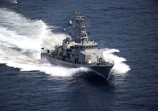 The cyclone-class coastal patrol ship USS Firebolt transits the Arabian Gulf