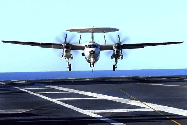An E-2C Hawkeye approaches for landing aboard USS John C Stennis