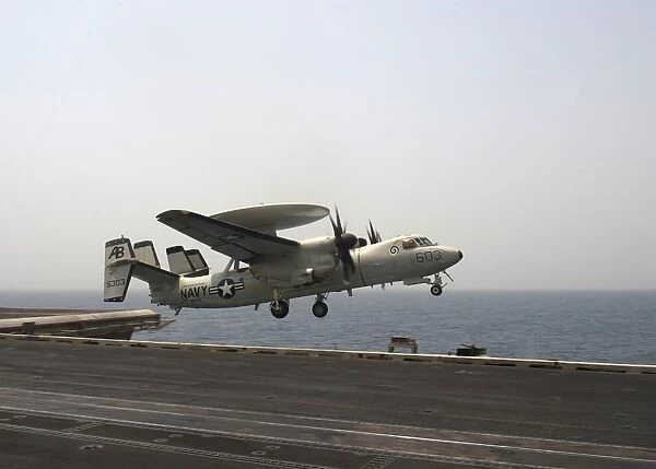An E-2C Hawkeye takes off from the flight deck of USS Enterprise