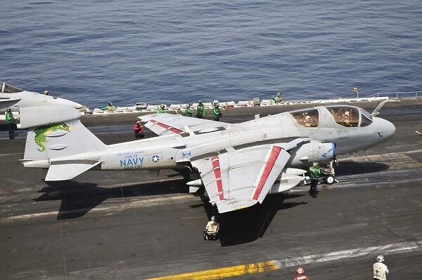 An EA-6B Prowler is ready to go from the flight deck of USS Harry S. Truman