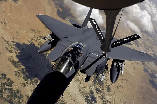 An F-15 Strike Eagle prepares for aerial refueling