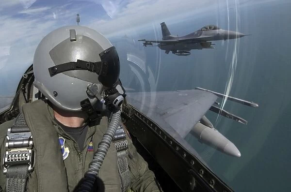 F-16 Fighting Falcons flying over southern Florida