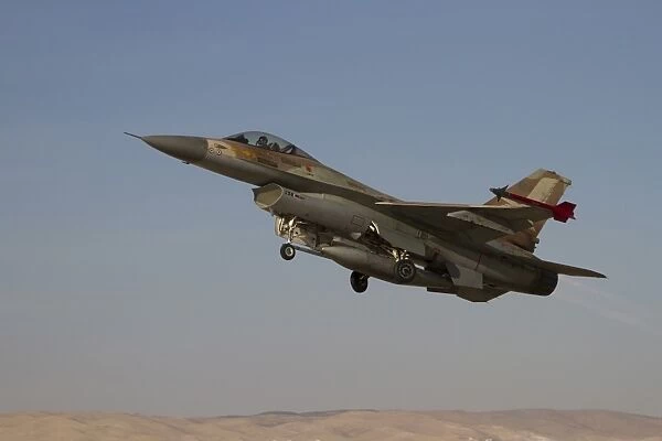 An F-16A Netz of the Israeli Air Force takes off from Nevatim Air Force Base